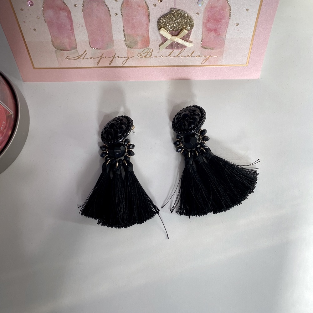 Beautiful black tasseled earrings.